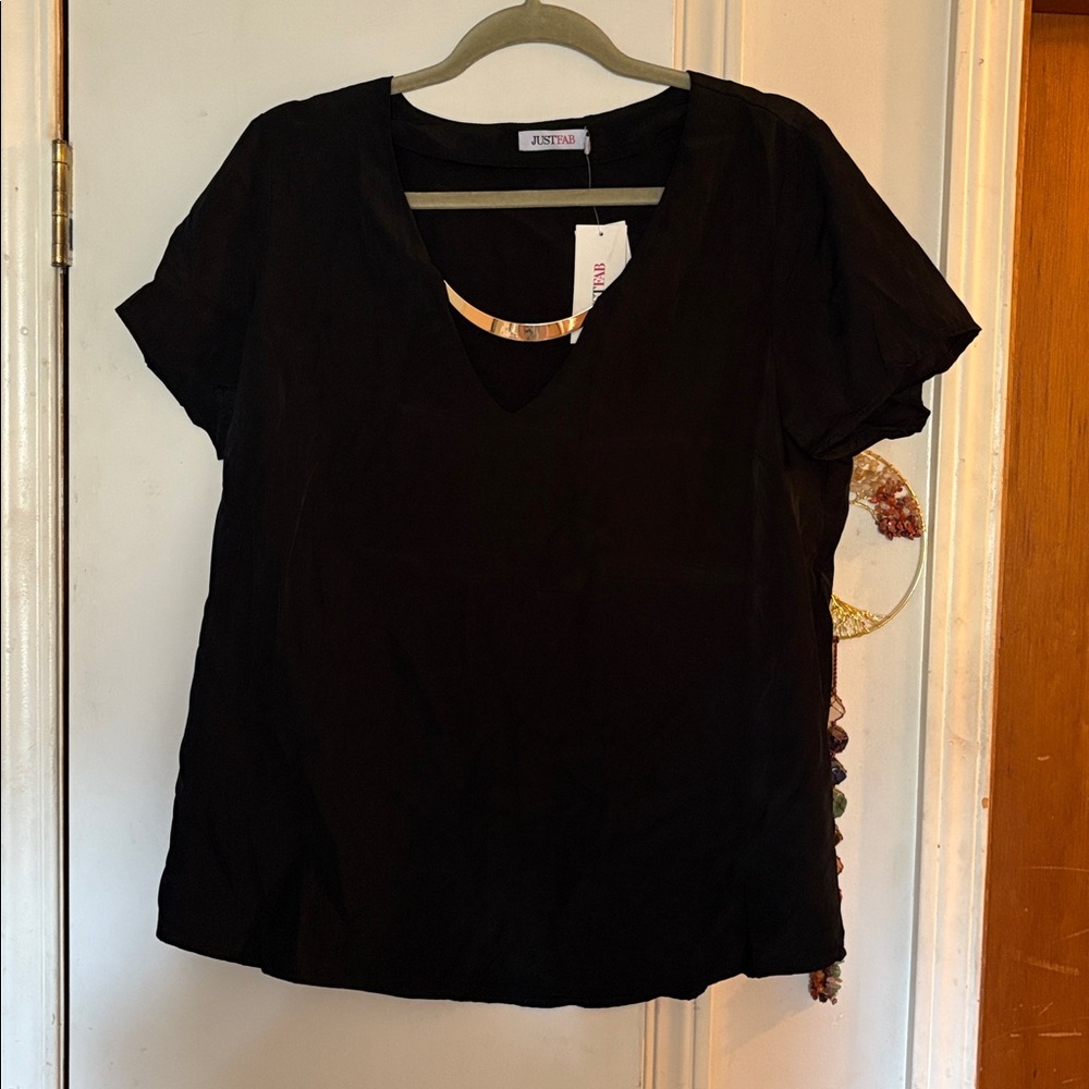 JustFab Elegant Black Blouse
With metal deco